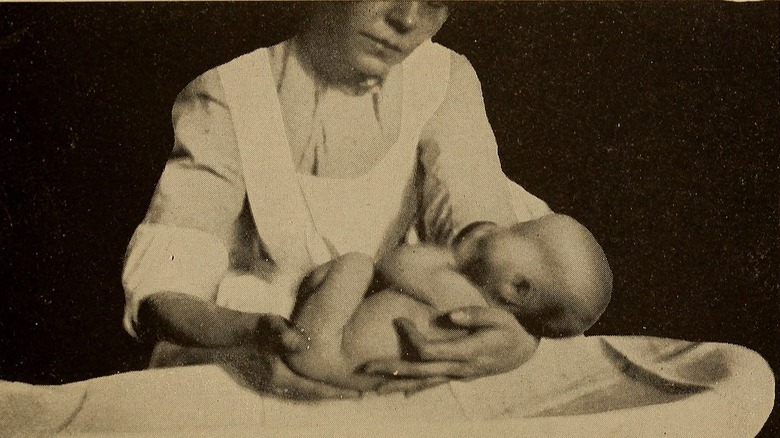 Nurse holding child
