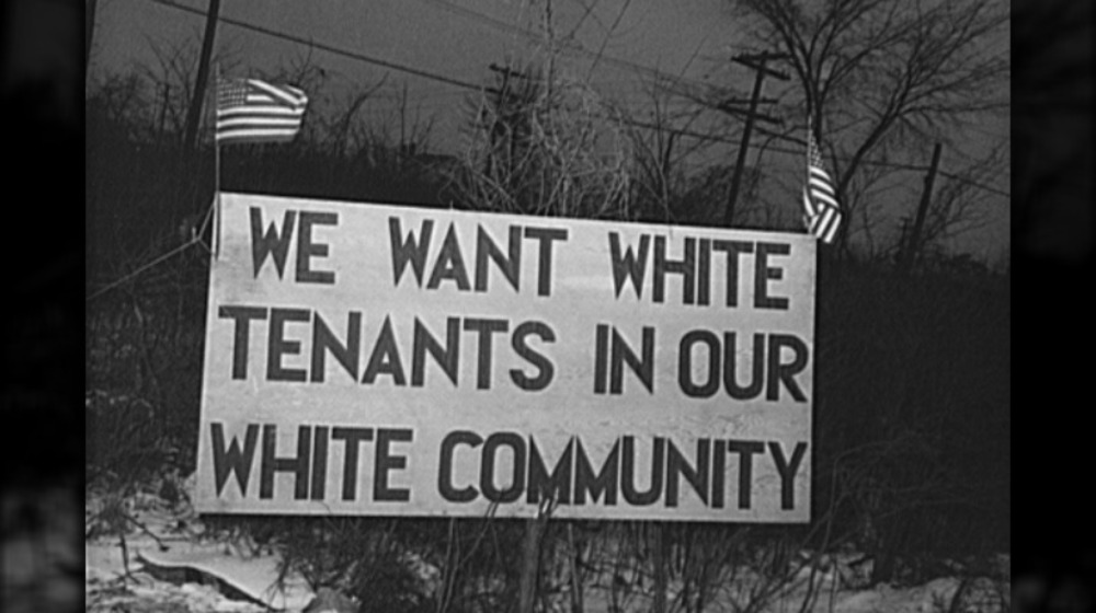 racist sign during detroit riots