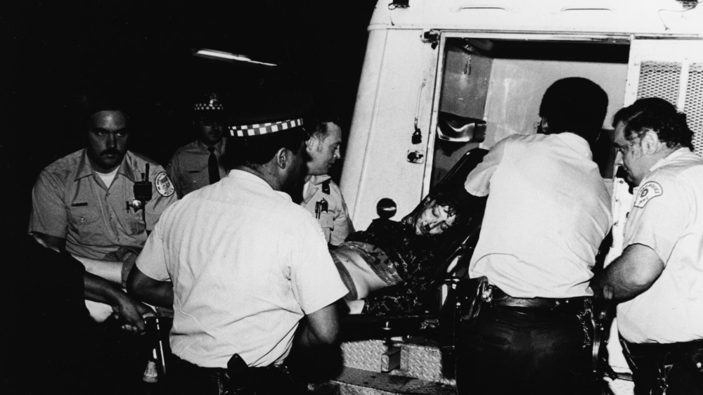 1968 chicago riot victim loaded into an ambulance