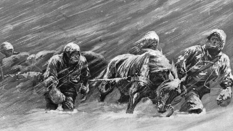 people fighting against a blizzard