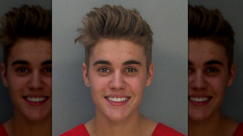 Justin Bieber mugshot smiling