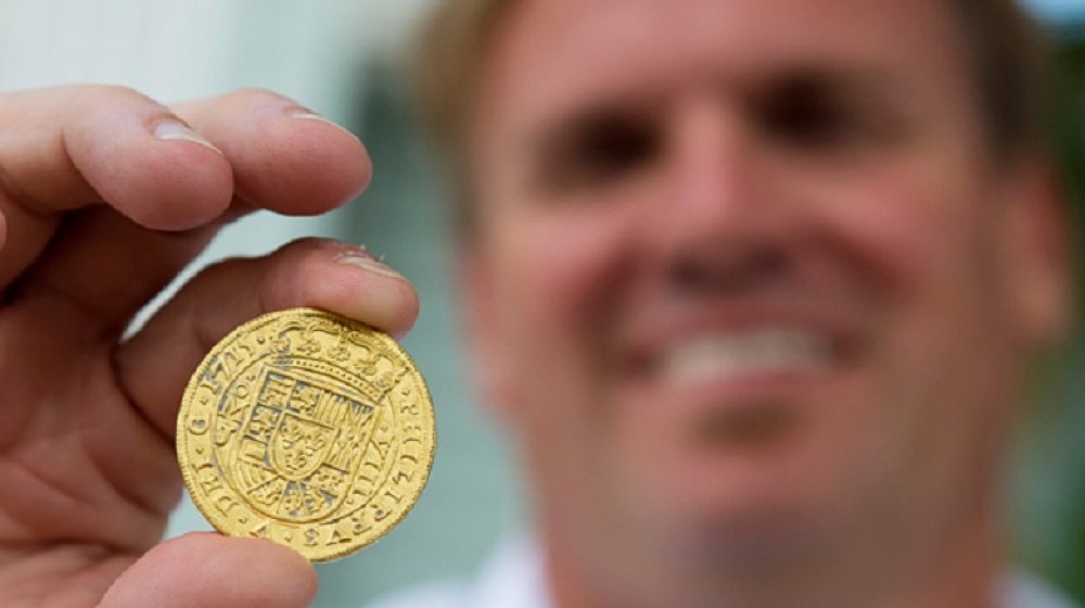Brent Brisben with gold coin