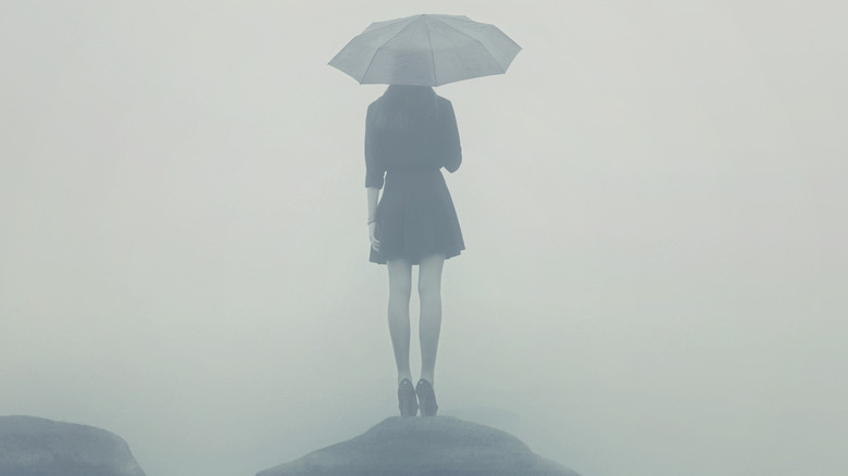 Woman in the fog