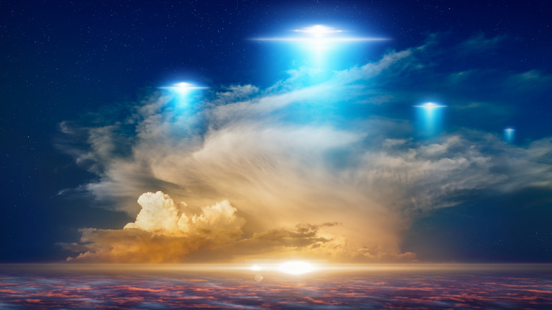 Illustration of flying saucers above the clouds.