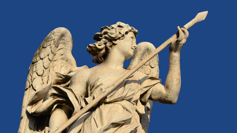 statue angel holding spear