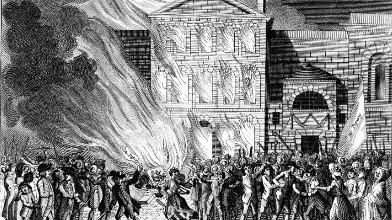 Townspeople fleeing from burning building