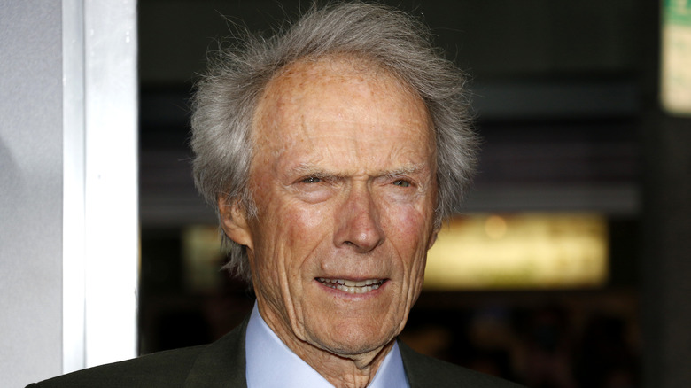 Clint Eastwood suit smiling grey hair