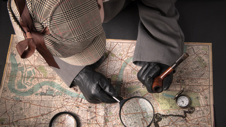 Sherlock Holmes cosplay with map