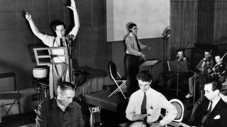 Orson Welles broadcasting The War of the Worlds
