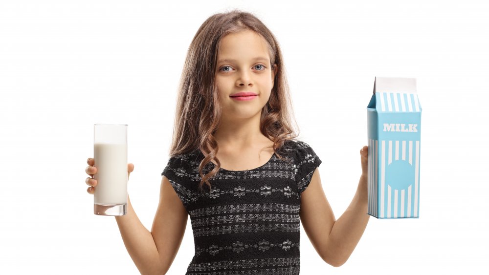 Girl with milk carton