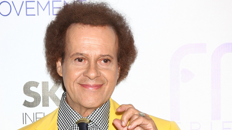 Richard Simmons in yellow suit