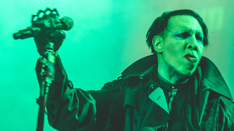 marilyn manson bathed in green light