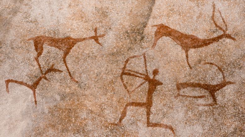Cave art of human hunting