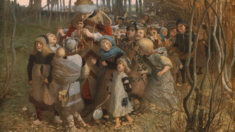 portrait of piped piper surrounded by children