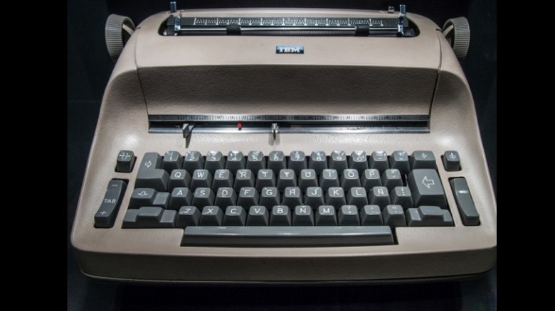 IBM typewriter on black background