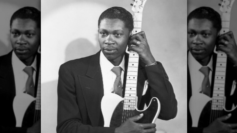 BB King in suit with white Fender Esquire guitar