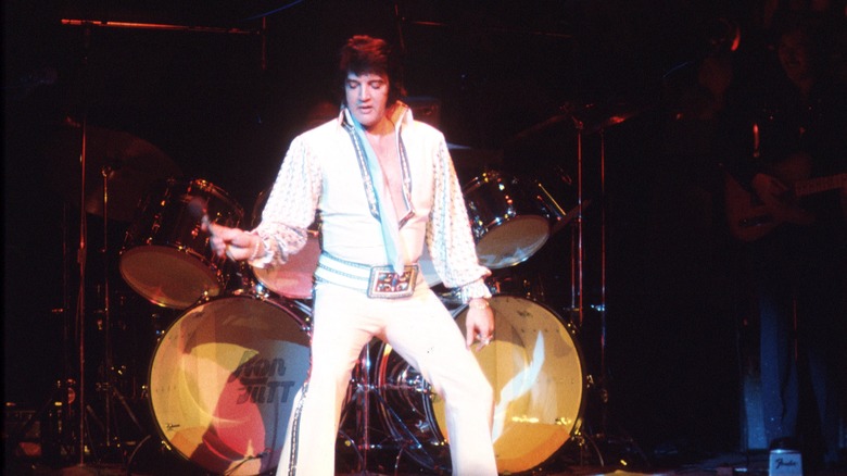 Elvis onstage in white jumpsuit