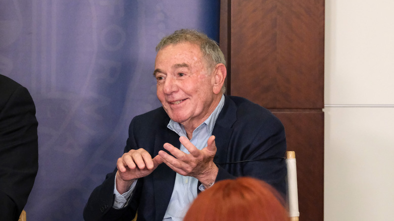 Howard Weitzman smiling and counting on his fingers, 2019