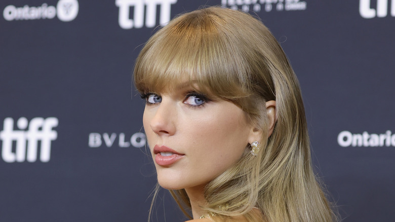 Taylor Swift looking back over her shoulder