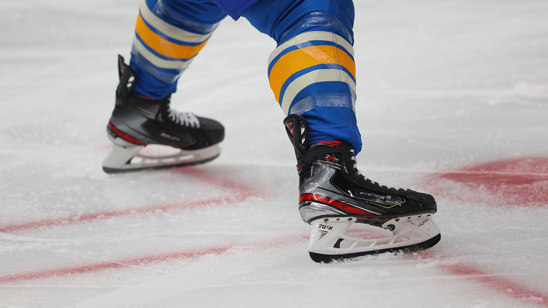 Close up of hockey player's skates 