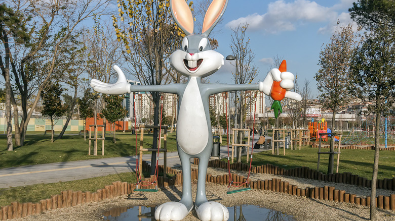Bugs Bunny statue in park with carrot