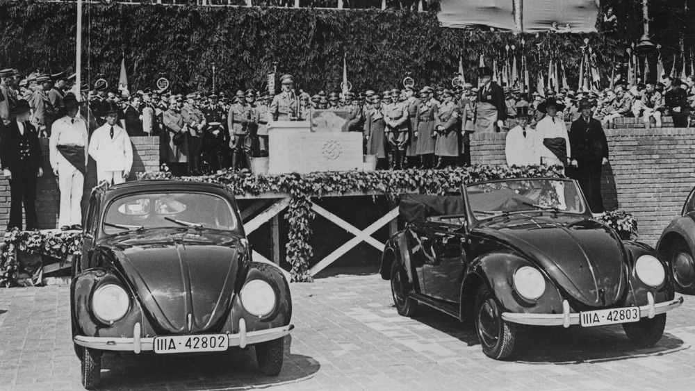 nazi political rally with Volkswagen Beetles 
