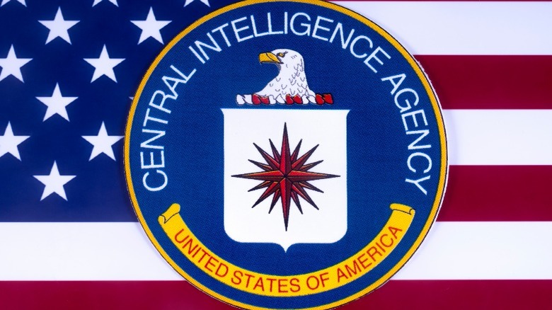 CIA crest on American flag