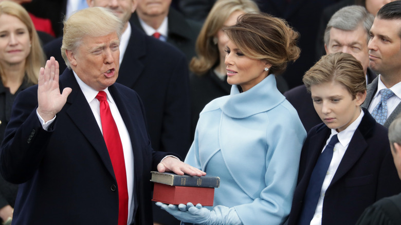Barron Trump with his parents at the inauguration 