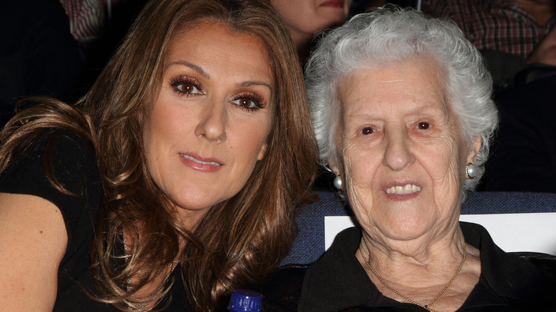 celine dion and therese tanguay dion smirking into camera