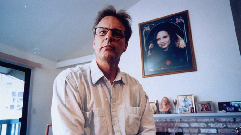 Marc Klaas in front of picture of Polly klaas