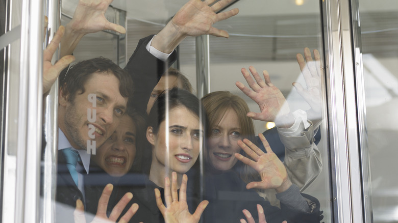People trapped in revolving door