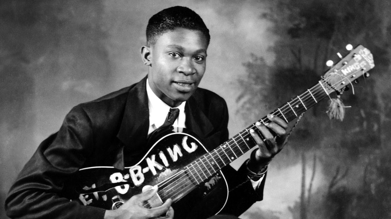 Young B.B. King posing with guitar