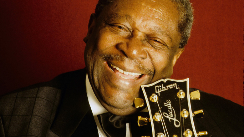 B.B. King holding guitar and smiling