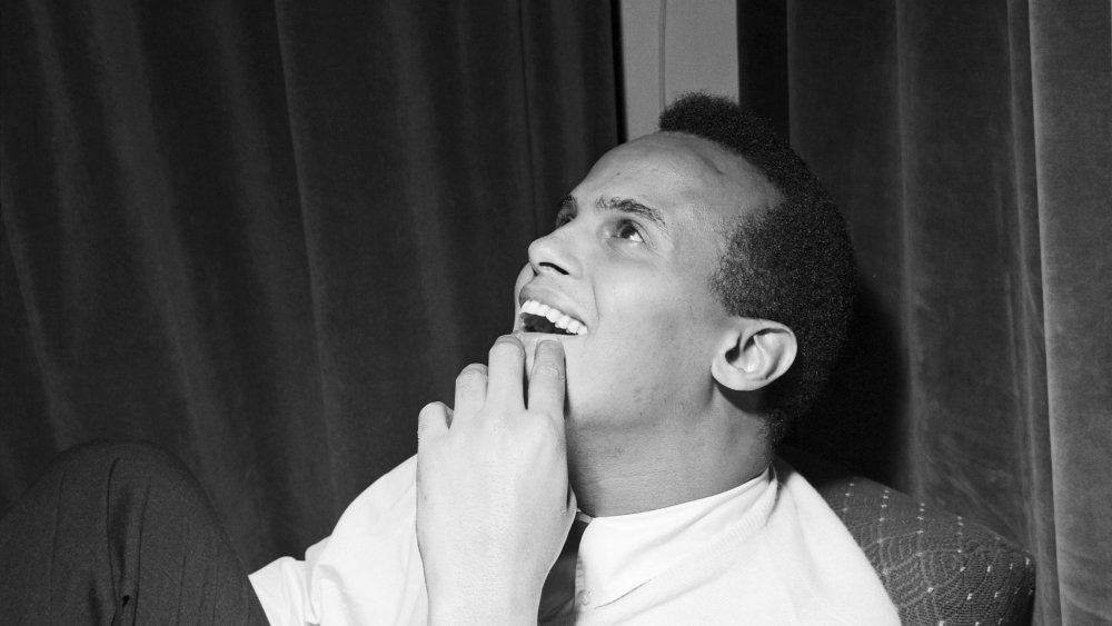 Harry Belafonte, posed, backstage, 1957.