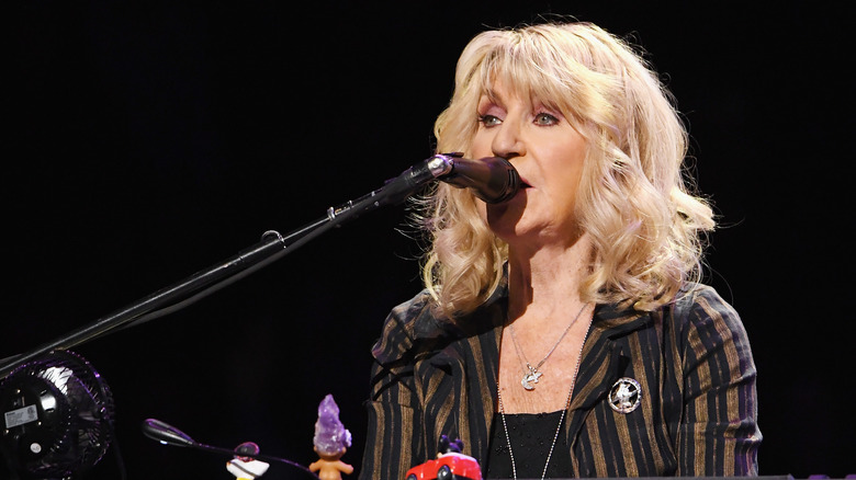 Christine McVie playing the keyboards in concert