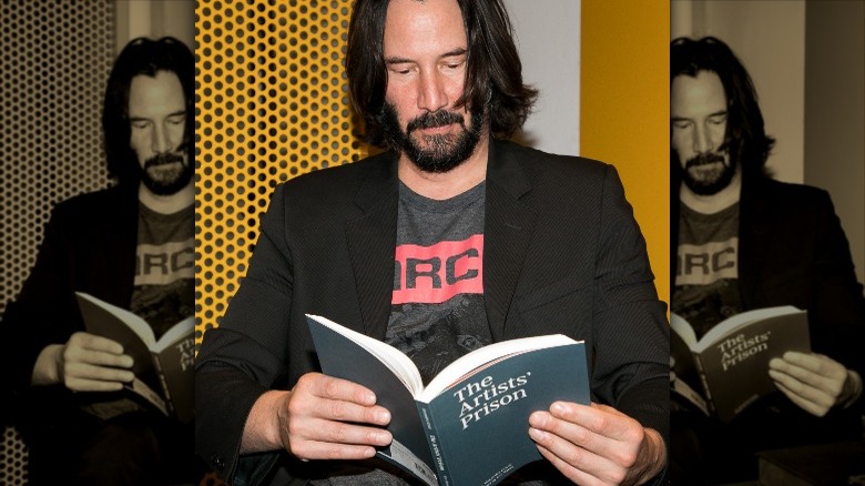 keanu reeves reading a book