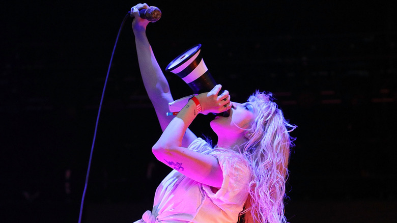 Hayley Williams onstage singing mic megaphone