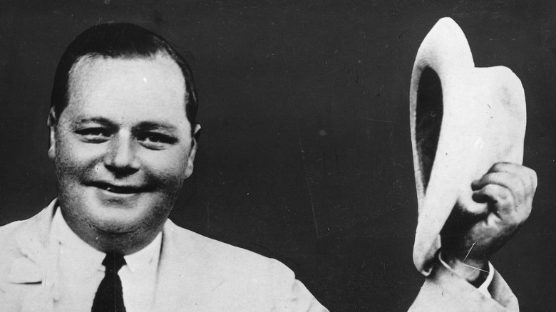 Roscoe "Fatty" Arbuckle smiling with hat