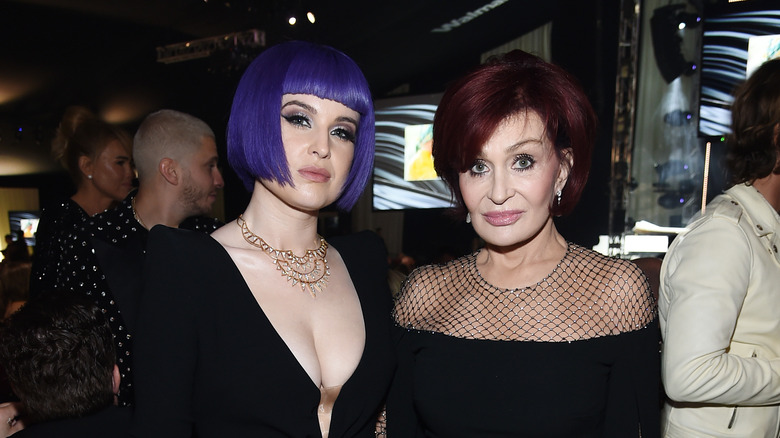 Kelly and Sharon Osbourne attend viewing party