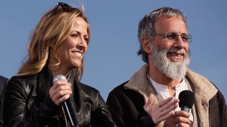 Cat Stevens/Yusuf Islam and Sheryl Crow smiling during an interview n 2010