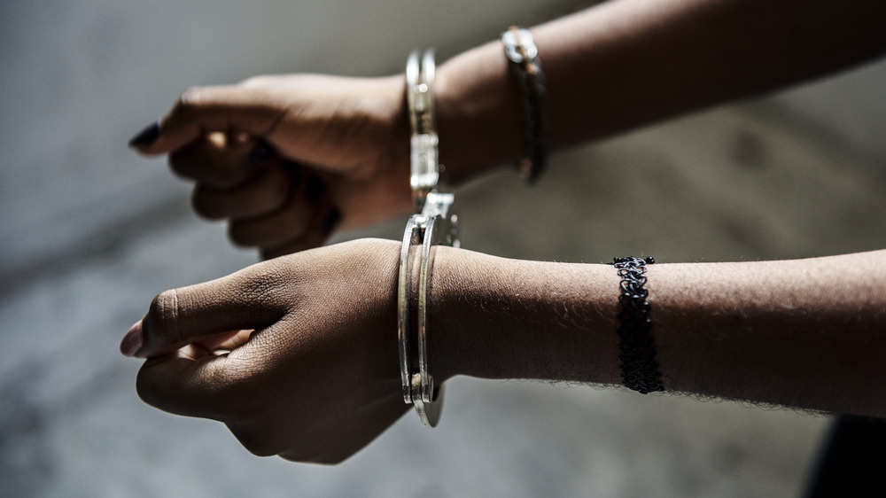 handcuffs around wrists