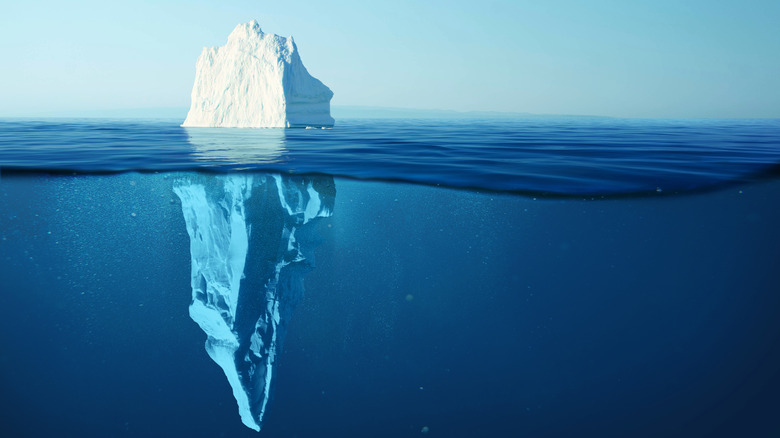 Photo of iceberg in calm water 