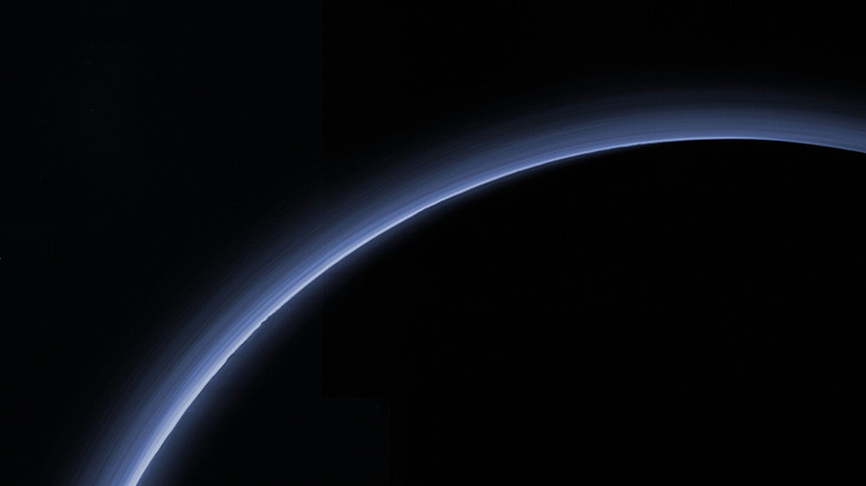 Silhouette of a planet, showing its atmosphere.
