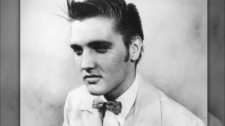 Elvis Presley looking away