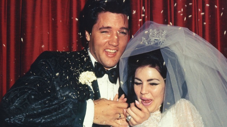 Elvis and Priscilla Presley laughing