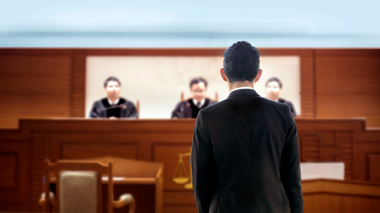 man standing in court