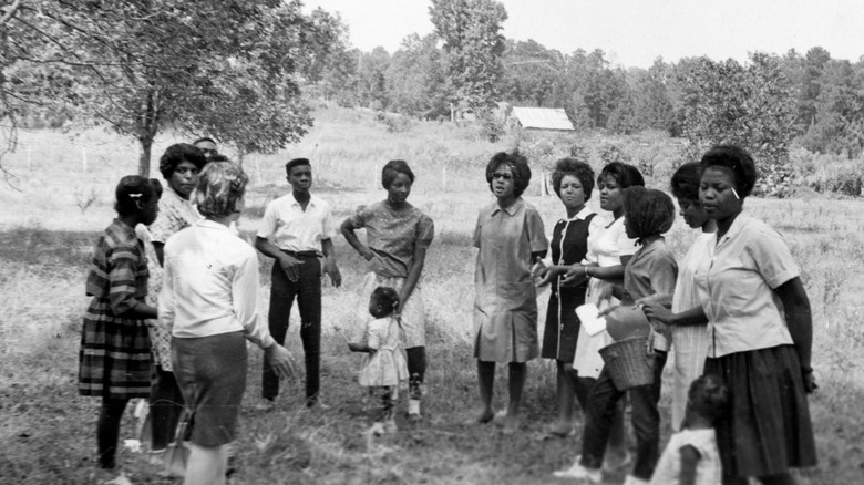 Freedom Summer people gathered in field
