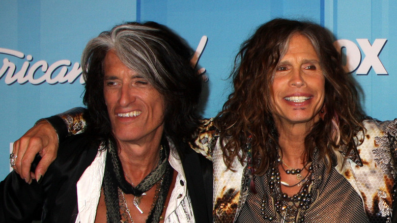Joe Perry and Steven Tyler smiling