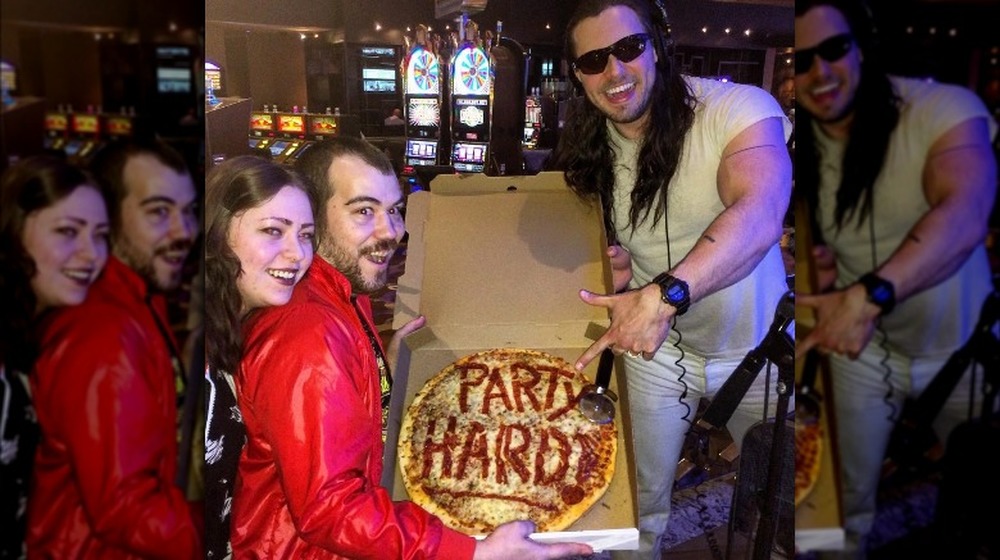Andrew W.K. with "Party Hard" pizza