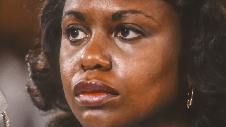 Anita Hill looks up at the judiciary committee